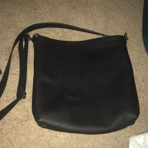 Crossbody bag with embroidered flaps